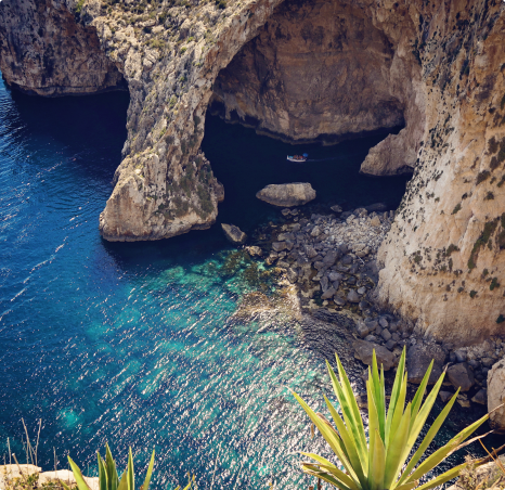 view blue grotto small boats with tourists 1